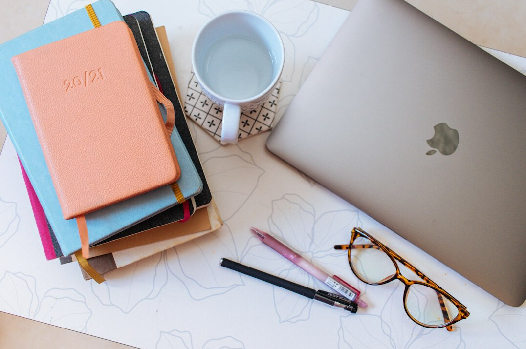 medical books and laptop
