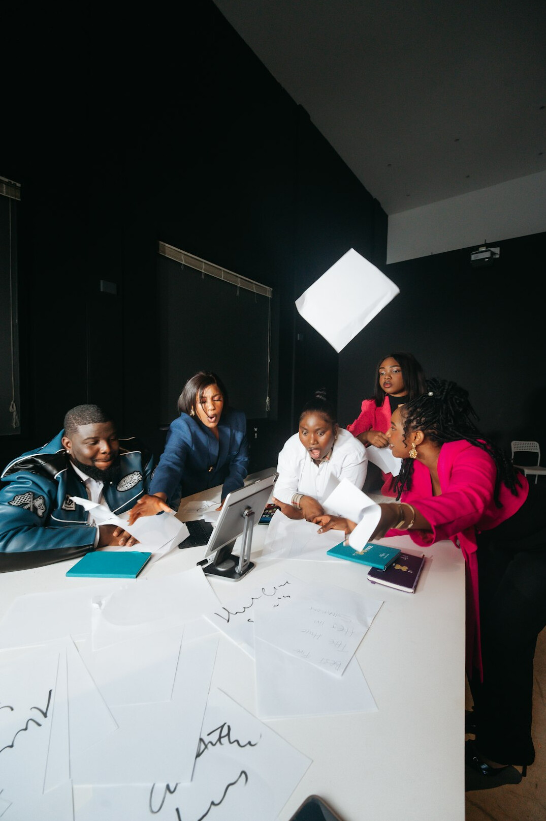 diverse group of adults studying