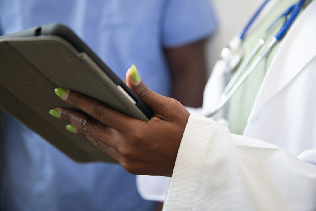 doctor reading medical journal